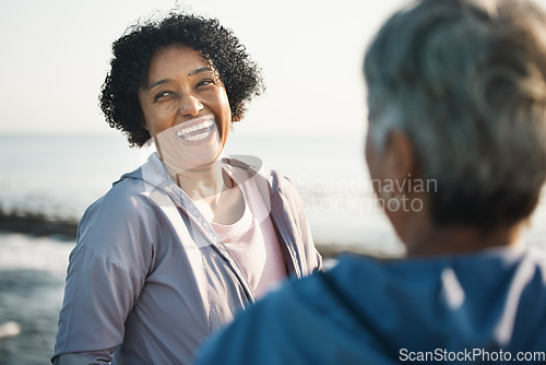 Image of Fitness, funny and smile with senior friends at beach for training, running and relax. Comic, happy and workout with old women laughing in nature for health, happiness and wellness together