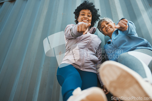 Image of Below, pointing and portrait of women in the city for cool pov, summer aesthetic or senior fun. Smile, retirement and elderly friends or people with a gesture, urban style or happiness in town