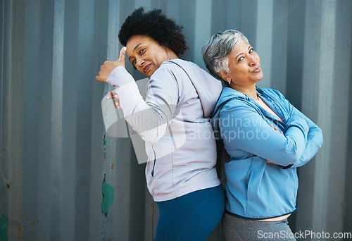 Image of Senior, women and friends, portrait and fitness, arms crossed with thumbs up pose and playful outdoor. Female people, friendship and cool with sportswear, exercise and fun together with wellness