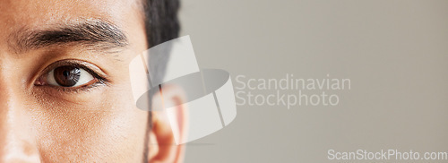 Image of Eye banner, portrait and man for optometry, vision and mockup for healthcare advertising. Half face, closeup and person on a backdrop with space for anatomy, focus and marketing of contact lenses