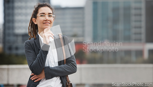 Image of Business woman, portrait and gen z outdoor with a smile and creative job pride. City, mockup up space and work commute with a professional and female person with trendy piercing from New York in town