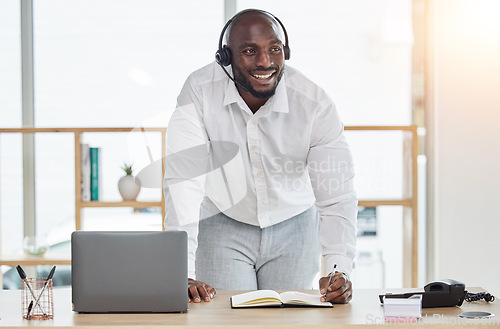 Image of Man, call center and writing, thinking or planning communication, telemarketing sales and customer support. Notes, schedule and consultant or african person for virtual discussion, ideas and computer