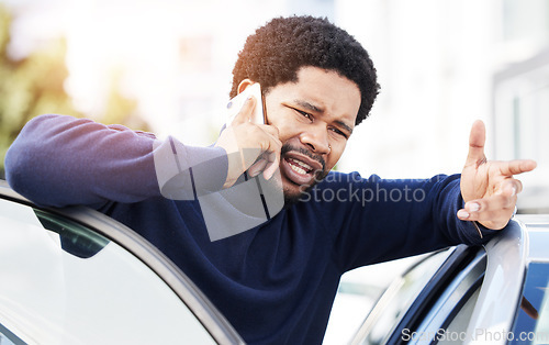 Image of Phone call, vehicle breakdown and a frustrated black man talking to roadside assistance with an issue or problem. Car, insurance and travel with a male client speaking on his mobile in the city
