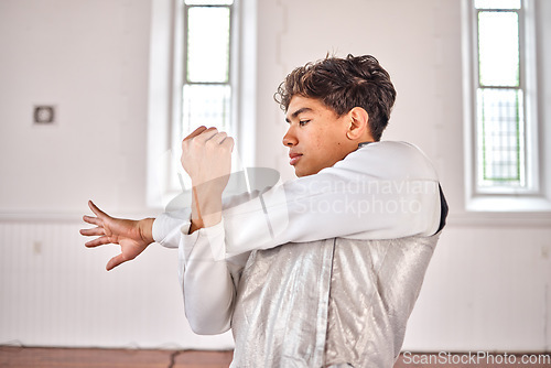 Image of Sports, fencing and man stretching, fitness and training with wellness, exercise and workout for competition. Health, sword fighting and male person warm up arms for challenge, match and practice