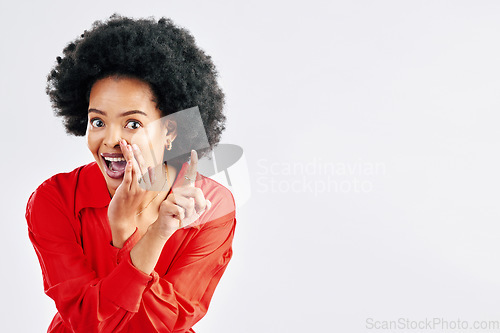 Image of Secret, excited pointing and woman portrait with whisper in studio with smile. Hope, happy and female person with mockup space and white background showing wait emoji hand gesture for bonus or prize