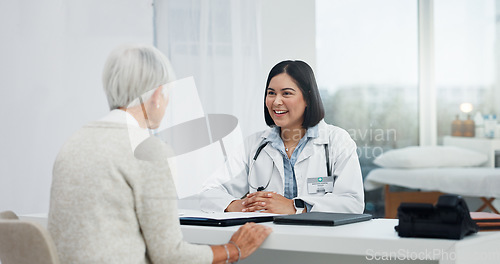 Image of Healthcare, talking and a doctor with a senior woman, shoulder pain problem and support in an office. Hospital, consulting and a female nurse speaking to an elderly patient about medical advice