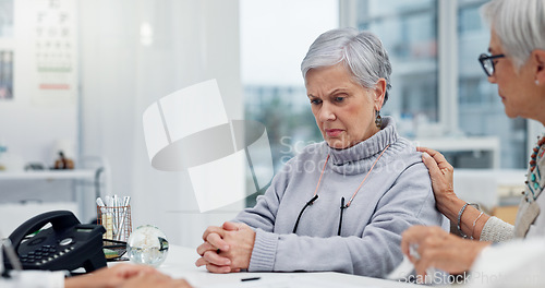 Image of Healthcare, cancer or bad news with a senior woman and friend talking to a doctor in the hospital. Medical, support and diagnosis with a medicine professional consulting a patient in the clinic