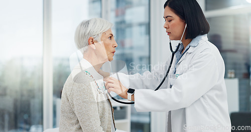 Image of Doctor, stethoscope and senior woman for cardiology exam, healthcare service and healthcare support or check. Heart, listening and medical professional, people or elderly patient breathing in clinic