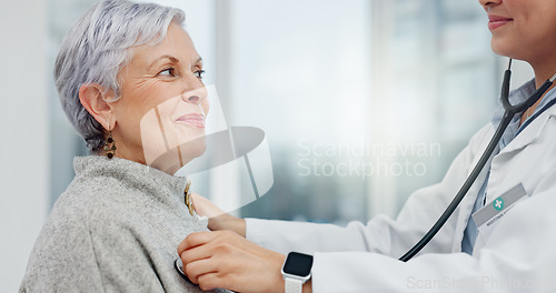 Image of Doctor, stethoscope and senior woman breathing for cardiology exam, healthcare service and support or check. Heart, listening and medical professional, happy people or elderly patient in consultation