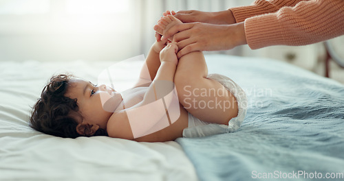 Image of Care, happy and mother with baby on bed for playful, love and free time. Happiness, smile and health with woman and newborn infant in bedroom for family home for support, excited and youth