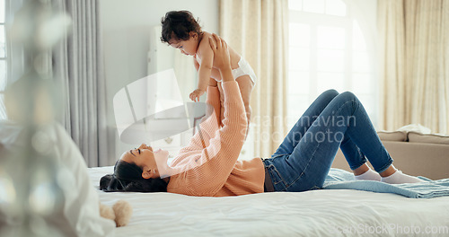 Image of Relax, happy and mother with baby on bed for playful, love and free time. Happiness, smile and health with woman and newborn infant in bedroom for family home for support, excited and youth