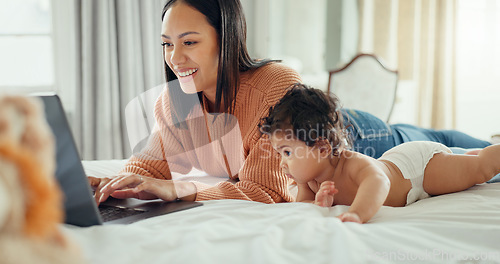 Image of Laptop, love and mother with baby in a bed for bonding, relax and playing in their home. Family, social media and female mom influencer with newborn in a bedroom and content creation for online blog