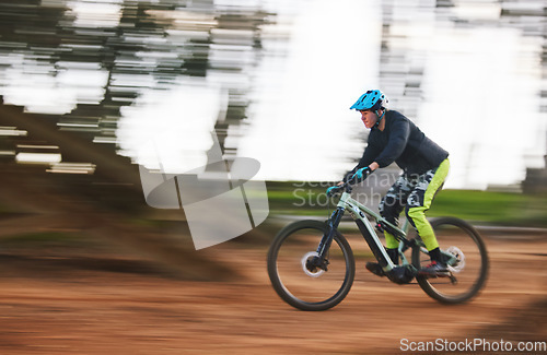 Image of Bike, man and speed with motion blur in forest for sport, race or adventure in summer, woods or nature. Extreme fast cycling, person and action on trail, workout or challenge for fitness with freedom