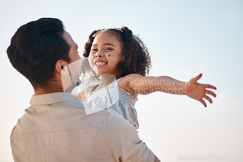 Image of Family, airplane and girl with dad at a beach happy, smile and having fun on summer vacation. Love, hug and excited child with father in nature for adventure, travel and bond, flying and freedom