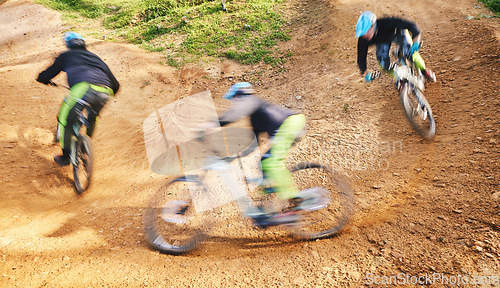 Image of Cycling, action and blur of man on bicycle for adrenaline on adventure, freedom and ride for speed. Mountain bike, sports and cyclist for training, exercise and fitness on dirt road, trail and track