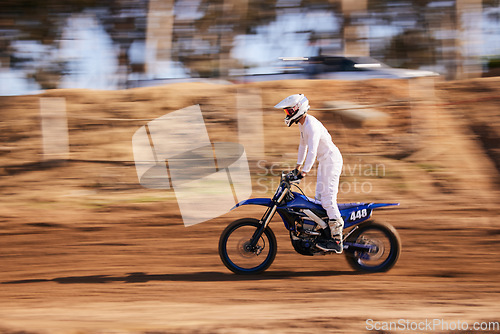 Image of Sports, motorbike and man in the countryside for fitness, adrenaline and speed training outdoor. Dirt road, bike and male driver on motorcycle with freedom, performance and moto hobby stunt in nature