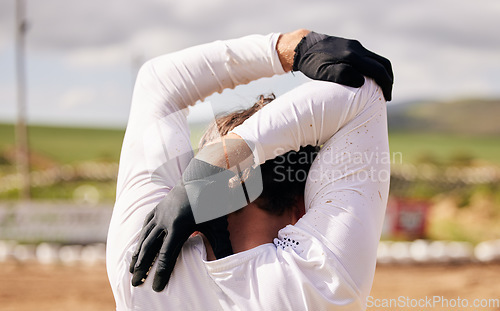 Image of Stretching arms, person and cycling in nature for fitness, training and travel in the countryside. Back, workout and an athlete with a warm up for bike sports, exercise or getting ready to start