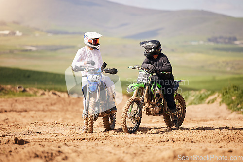 Image of Friends, sports and men with motorcycle in countryside for fun, hobby and Moto stunt training, practice or freedom. Off road, motorbike and biker people in nature for adrenaline, challenge or race