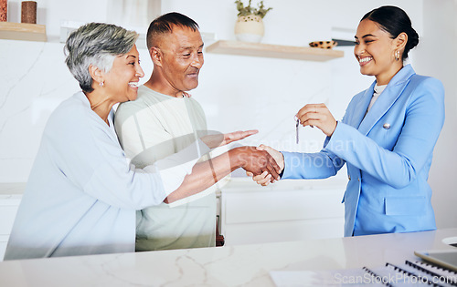 Image of Happy senior couple, realtor and keys to new home in handshake for mortgage, property or investment. Excited elderly man and woman shaking hands for real estate retirement, house payment or purchase