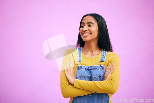 Image of Smile, woman and happy with arms crossed in studio with mockup space, gen z style and fashion. Pink background, female person and girl with confidence and idea with modern, trendy and clothing