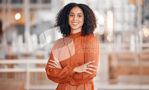 Image of Smile, arms crossed and portrait of a woman at work for business pride and corporate confidence. Happy, office and a young employee with career empowerment and job motivation in the workplace