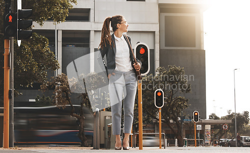 Image of City, walking and woman on a crosswalk wait with travel, business commute and urban journey. Road, outdoor and female professional in morning traveling for work, career and job in New York on street