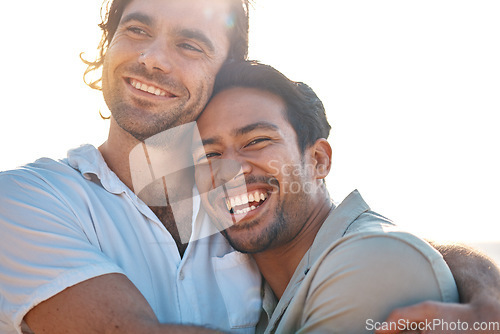 Image of Love, hug and gay couple, men with sky and smile on summer vacation together in Thailand. Sunset, ocean and romance, happy lgbt people embrace in nature on fun holiday with pride, laughing and fun.