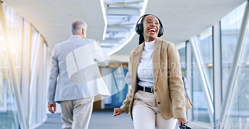 Image of Headphones, music and business woman dance in office walking with celebration for weekend. Company, female worker and web radio listening to audio feeling happy with freedom and web song with smile