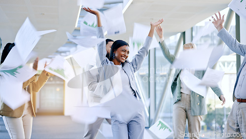 Image of Documents in air, celebration and business people dance in office for achievement, winner and goals. Teamwork, collaboration and excited men and women dancing, throw paperwork and winning for success