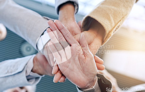 Image of Stack, teamwork or hands of business people for motivation for mission, collaboration or support. Partnership, low angle closeup or colleagues in meeting huddle with vision or solidarity together