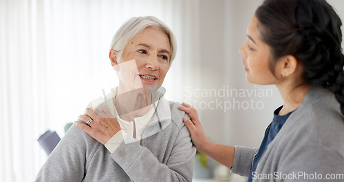 Image of Consultation, physical therapy and senior woman with a nurse in a medical clinic or rehabilitation center. Healthcare, wellness and elderly female patient talking to a physiotherapist at a checkup.