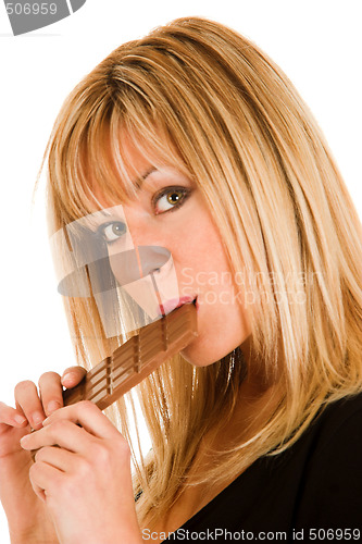 Image of woman eating chocolate