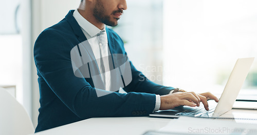 Image of Business man, suit and typing on laptop for network update, corporate insight and review in law firm. Closeup of lawyer, attorney and working on computer for legal research, planning admin and email