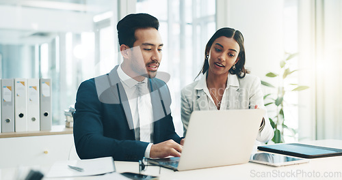 Image of Businessman, laptop and team in finance discussion, project planning or schedule at office. Asian man and business woman working on computer for corporate statistics or financial plan at workplace