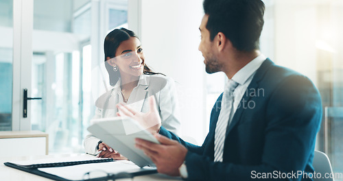 Image of Tablet, meeting and partnership with business people working in an office as a team for research. Technology, planning or teamwork with a man and woman employee reading information in the workplace