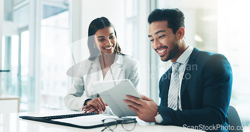 Image of Tablet, meeting and partnership with business people working in an office as a team for research. Technology, planning or teamwork with a man and woman employee reading information in the workplace