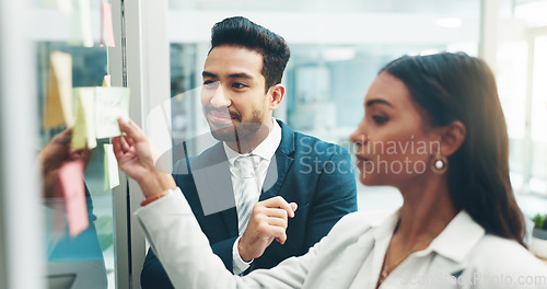 Image of Business people, teamwork and brainstorming on glass in office for agenda, collaboration and planning ideas. Man, woman and employees at board for feedback of schedule, mindmap and timeline of goals