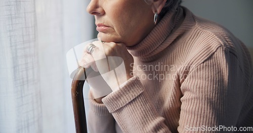 Image of Thinking, window and hands of old woman and walking stick in bedroom for wellness, retirement and healthcare. Depression, mental health and nursing home with closeup of patient with a disability