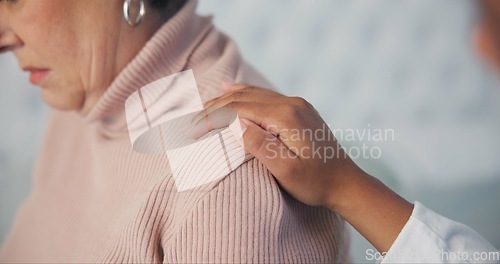 Image of Sympathy, consoling and closeup of caregiver with woman after cancer diagnosis in retirement home. Healthcare, consultation and zoom of elderly female patient with hand of doctor at checkup in room.