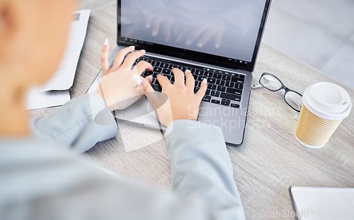 Image of Hands, laptop and business woman with mockup in home office for design, advertising or marketing space. Keyboard, typing and social media financial influencer with screen for blog content creation