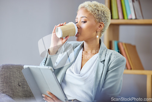 Image of Coffee break, tablet and business woman on a sofa relax, reading and checking email while working remote. Freelance, tea and female in living room with social media, search and ebook in her home