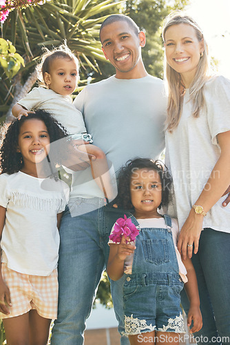 Image of Smile, parents or portrait of children in park with support, care or love in an interracial or blended family. Happy, mom or proud dad outside to enjoy bonding in nature with girls, kids or siblings
