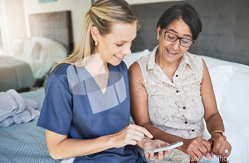 Image of Happy woman, nurse and phone in elderly care for consultation, support or healthcare diagnosis at home. Female person, caregiver or medical professional on mobile smartphone to help senior patient