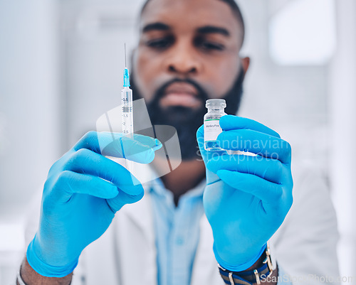 Image of Man, doctor and hands with syringe for vaccine, injection or flu shot in healthcare at hospital. Closeup of male person or medical expert with needle and vial for vaccination or monkey pox at clinic