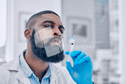 Image of Medicine, research and vaccine with black man in laboratory for science, pharmacy and cure. Healthcare, medical and injection with scientist and syringe for virus, expert and pathology testing