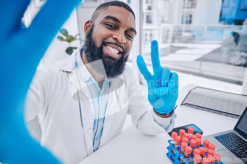 Image of Scientist, portrait of man and peace for selfie in medical laboratory, research investigation and testing. Face of african science expert smile for profile picture with v sign, emoji and social media