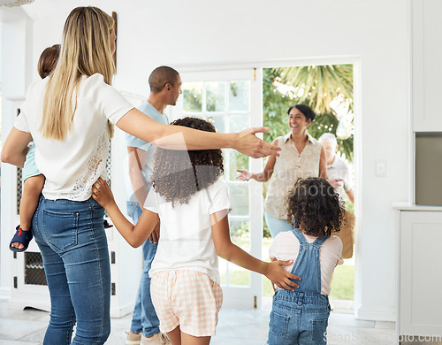 Image of Happy, home and family welcome grandparents by door excited for bonding, spending time and relationship. Family, hello and grandmother, grandfather and children smile for greeting, visit and arrival