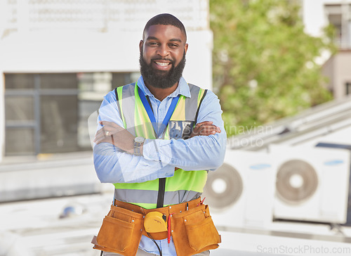 Image of Black man, portrait and construction worker, arms crossed and maintenance, engineer smile and architecture outdoor. Male contractor, professional renovation and urban infrastructure with handyman