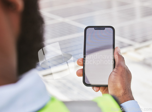 Image of Phone screen, hand and construction worker with a chat, reading notification or building information. Site, back and a handyman, architect or builder with a blank mobile with mockup for communication