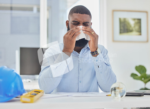 Image of Sick architect, blowing nose or man in office or engineer with hay fever sneezing or illness in workplace. Civil engineering designer or manager with toilet paper tissue, allergy virus or flu disease